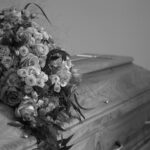 flowers decoration on wooden casket